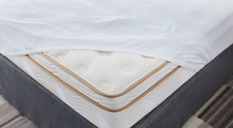 The Best Mattress Protectors of 2025 - Best Overall - Saatva Waterproof Mattress Protector